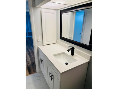 Own this exceptional, fully remodeled 2-bedroom, 2-bathroom on Cove Cay Country Club in Florida - for sale on GolfHomes.com, golf home, golf lot