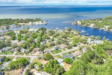 Fully remodeled 4BR/4BA home on nearly 3/4 acre in the desirable on Indian Bayou Golf and Country Club in Florida - for sale on GolfHomes.com, golf home, golf lot