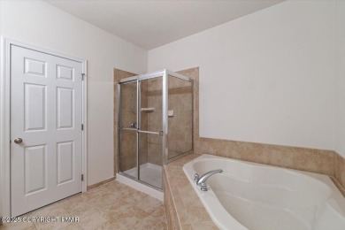 Step into sophistication with this beautifully designed End-Unit on Country Club of the Poconos Golf Course in Pennsylvania - for sale on GolfHomes.com, golf home, golf lot