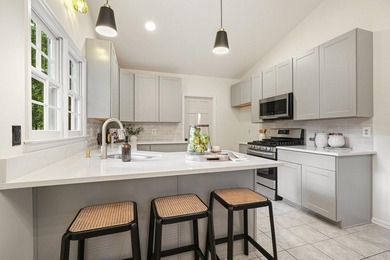 A Modern Cottage Retreat with Golf Course Views Front & Back on Canongate At Eagle Watch Golf Club in Georgia - for sale on GolfHomes.com, golf home, golf lot