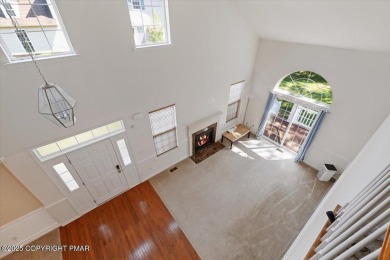 Step into sophistication with this beautifully designed End-Unit on Country Club of the Poconos Golf Course in Pennsylvania - for sale on GolfHomes.com, golf home, golf lot