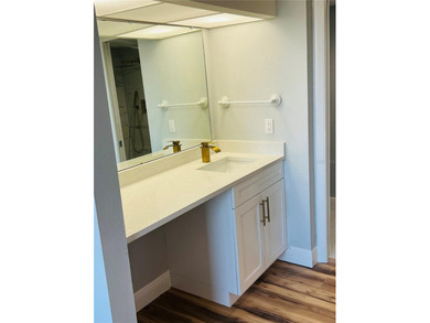 Own this exceptional, fully remodeled 2-bedroom, 2-bathroom on Cove Cay Country Club in Florida - for sale on GolfHomes.com, golf home, golf lot