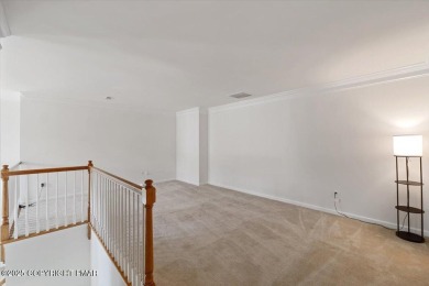 Step into sophistication with this beautifully designed End-Unit on Country Club of the Poconos Golf Course in Pennsylvania - for sale on GolfHomes.com, golf home, golf lot