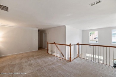 Step into sophistication with this beautifully designed End-Unit on Country Club of the Poconos Golf Course in Pennsylvania - for sale on GolfHomes.com, golf home, golf lot