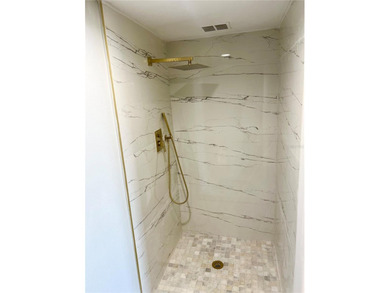 Own this exceptional, fully remodeled 2-bedroom, 2-bathroom on Cove Cay Country Club in Florida - for sale on GolfHomes.com, golf home, golf lot