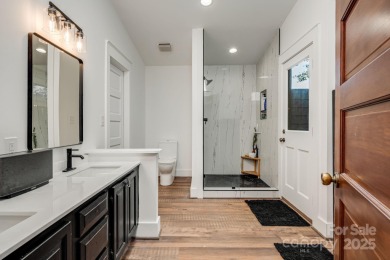 Welcome to this beautifully updated 4-bedroom, 4-bath home on Rumbling Bald Resort on Lake Lure in North Carolina - for sale on GolfHomes.com, golf home, golf lot