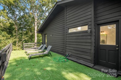 Welcome to this beautifully updated 4-bedroom, 4-bath home on Rumbling Bald Resort on Lake Lure in North Carolina - for sale on GolfHomes.com, golf home, golf lot