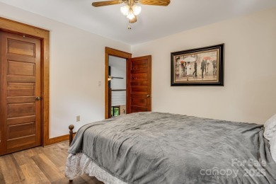 Welcome to this beautifully updated 4-bedroom, 4-bath home on Rumbling Bald Resort on Lake Lure in North Carolina - for sale on GolfHomes.com, golf home, golf lot