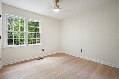 A Modern Cottage Retreat with Golf Course Views Front & Back on Canongate At Eagle Watch Golf Club in Georgia - for sale on GolfHomes.com, golf home, golf lot