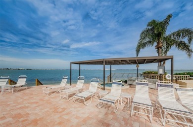 Nice golf course and water views along with westerly sunset on Isla Del Sol Yacht and Country Club in Florida - for sale on GolfHomes.com, golf home, golf lot