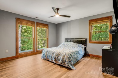 Welcome to this beautifully updated 4-bedroom, 4-bath home on Rumbling Bald Resort on Lake Lure in North Carolina - for sale on GolfHomes.com, golf home, golf lot