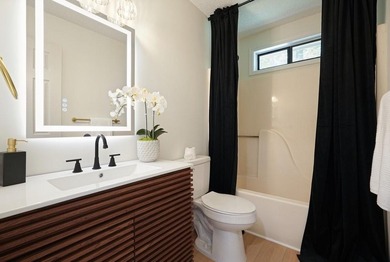 A Modern Cottage Retreat with Golf Course Views Front & Back on Canongate At Eagle Watch Golf Club in Georgia - for sale on GolfHomes.com, golf home, golf lot