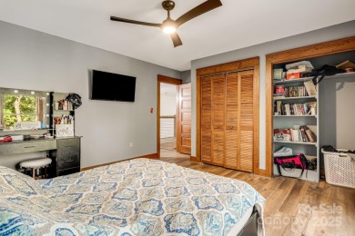 Welcome to this beautifully updated 4-bedroom, 4-bath home on Rumbling Bald Resort on Lake Lure in North Carolina - for sale on GolfHomes.com, golf home, golf lot