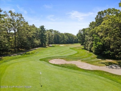 Step into sophistication with this beautifully designed End-Unit on Country Club of the Poconos Golf Course in Pennsylvania - for sale on GolfHomes.com, golf home, golf lot