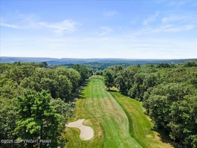 Step into sophistication with this beautifully designed End-Unit on Country Club of the Poconos Golf Course in Pennsylvania - for sale on GolfHomes.com, golf home, golf lot
