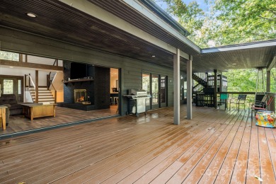 Welcome to this beautifully updated 4-bedroom, 4-bath home on Rumbling Bald Resort on Lake Lure in North Carolina - for sale on GolfHomes.com, golf home, golf lot