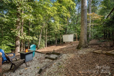 Welcome to this beautifully updated 4-bedroom, 4-bath home on Rumbling Bald Resort on Lake Lure in North Carolina - for sale on GolfHomes.com, golf home, golf lot