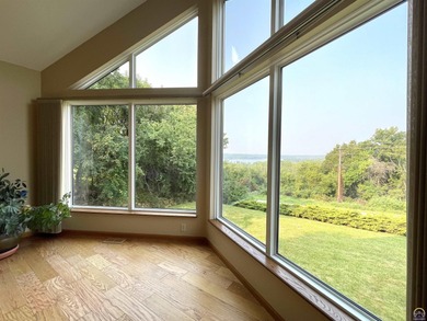 Lake living usually encourages boat, jet ski, golf cart, SXS on Lake Perry Country Club in Kansas - for sale on GolfHomes.com, golf home, golf lot