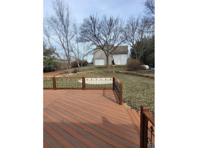 Lake living usually encourages boat, jet ski, golf cart, SXS on Lake Perry Country Club in Kansas - for sale on GolfHomes.com, golf home, golf lot