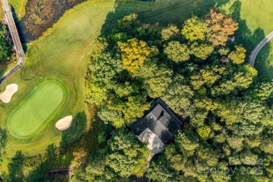 Welcome to this beautifully updated 4-bedroom, 4-bath home on Rumbling Bald Resort on Lake Lure in North Carolina - for sale on GolfHomes.com, golf home, golf lot