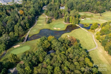 Welcome to this beautifully updated 4-bedroom, 4-bath home on Rumbling Bald Resort on Lake Lure in North Carolina - for sale on GolfHomes.com, golf home, golf lot