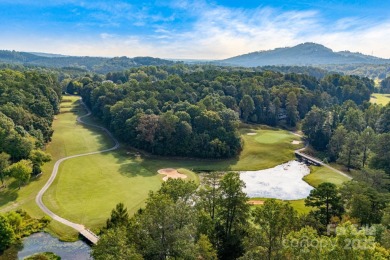 Welcome to this beautifully updated 4-bedroom, 4-bath home on Rumbling Bald Resort on Lake Lure in North Carolina - for sale on GolfHomes.com, golf home, golf lot
