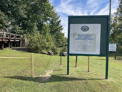 Brand New Exterior Paint completed April 2025! Adorable River on Riverland Country Club in Arkansas - for sale on GolfHomes.com, golf home, golf lot