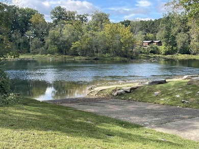Brand New Exterior Paint completed April 2025! Adorable River on Riverland Country Club in Arkansas - for sale on GolfHomes.com, golf home, golf lot