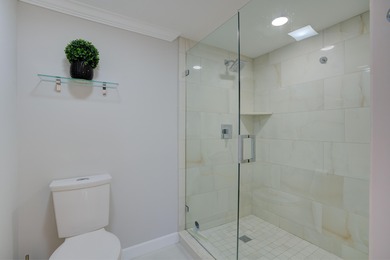 A rare vantage point offering sweeping ocean views from the on Jupiter Dunes Golf Course in Florida - for sale on GolfHomes.com, golf home, golf lot