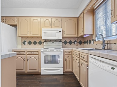 Across the street from DeSoto Lake! This charming 3-bedroom on DeSoto Golf Course in Arkansas - for sale on GolfHomes.com, golf home, golf lot