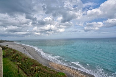 A rare vantage point offering sweeping ocean views from the on Jupiter Dunes Golf Course in Florida - for sale on GolfHomes.com, golf home, golf lot
