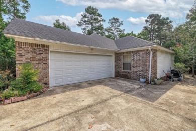 This beautiful brick home offers 3 bedrooms and 2 1/2 bathrooms on Ponce De Leon Golf Course in Arkansas - for sale on GolfHomes.com, golf home, golf lot