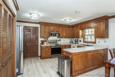WELCOME TO THIS CHARMING TRADITIONAL 4BED/2.5BA HOME IN on Kings Grant Golf and Country Club in North Carolina - for sale on GolfHomes.com, golf home, golf lot