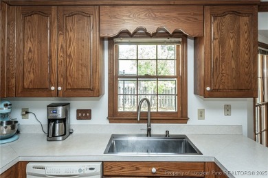 WELCOME TO THIS CHARMING TRADITIONAL 4BED/2.5BA HOME IN on Kings Grant Golf and Country Club in North Carolina - for sale on GolfHomes.com, golf home, golf lot