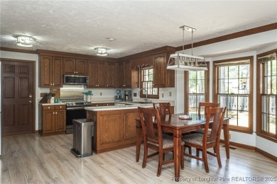 WELCOME TO THIS CHARMING TRADITIONAL 4BED/2.5BA HOME IN on Kings Grant Golf and Country Club in North Carolina - for sale on GolfHomes.com, golf home, golf lot