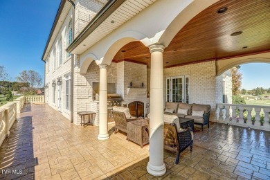A stately brick-column entrance leads to this breathtaking on The Crossings Golf Club in Tennessee - for sale on GolfHomes.com, golf home, golf lot
