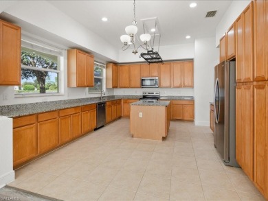 This popular Giacosa model is light, bright and move-in ready on Valencia Golf and Country Club in Florida - for sale on GolfHomes.com, golf home, golf lot