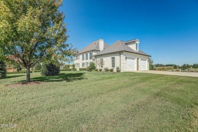 A stately brick-column entrance leads to this breathtaking on The Crossings Golf Club in Tennessee - for sale on GolfHomes.com, golf home, golf lot