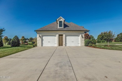 A stately brick-column entrance leads to this breathtaking on The Crossings Golf Club in Tennessee - for sale on GolfHomes.com, golf home, golf lot