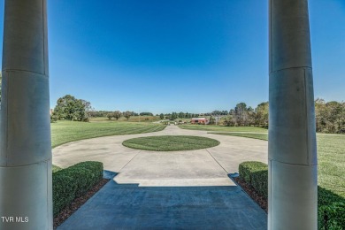 A stately brick-column entrance leads to this breathtaking on The Crossings Golf Club in Tennessee - for sale on GolfHomes.com, golf home, golf lot