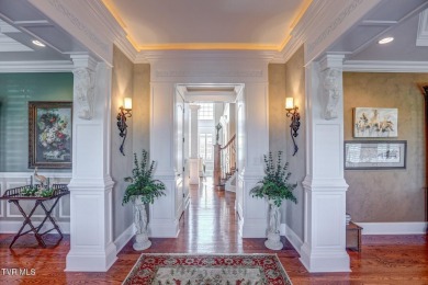 A stately brick-column entrance leads to this breathtaking on The Crossings Golf Club in Tennessee - for sale on GolfHomes.com, golf home, golf lot