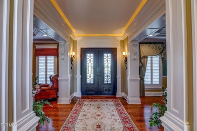 A stately brick-column entrance leads to this breathtaking on The Crossings Golf Club in Tennessee - for sale on GolfHomes.com, golf home, golf lot