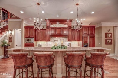 A stately brick-column entrance leads to this breathtaking on The Crossings Golf Club in Tennessee - for sale on GolfHomes.com, golf home, golf lot