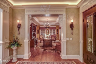 A stately brick-column entrance leads to this breathtaking on The Crossings Golf Club in Tennessee - for sale on GolfHomes.com, golf home, golf lot