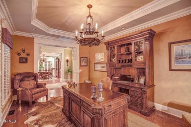 A stately brick-column entrance leads to this breathtaking on The Crossings Golf Club in Tennessee - for sale on GolfHomes.com, golf home, golf lot
