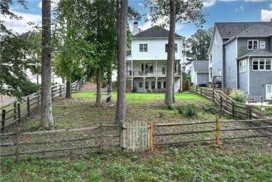 This gorgeous home located directly onto the Hampton Golf on Hampton Golf Village in Georgia - for sale on GolfHomes.com, golf home, golf lot