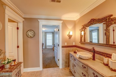 A stately brick-column entrance leads to this breathtaking on The Crossings Golf Club in Tennessee - for sale on GolfHomes.com, golf home, golf lot