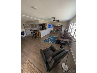 This house is located less than 1000 ft. from Three Sisters on Plantation Inn and Golf Resort  in Florida - for sale on GolfHomes.com, golf home, golf lot