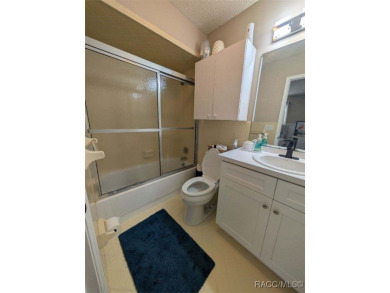This house is located less than 1000 ft. from Three Sisters on Plantation Inn and Golf Resort  in Florida - for sale on GolfHomes.com, golf home, golf lot