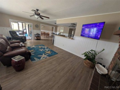 This house is located less than 1000 ft. from Three Sisters on Plantation Inn and Golf Resort  in Florida - for sale on GolfHomes.com, golf home, golf lot